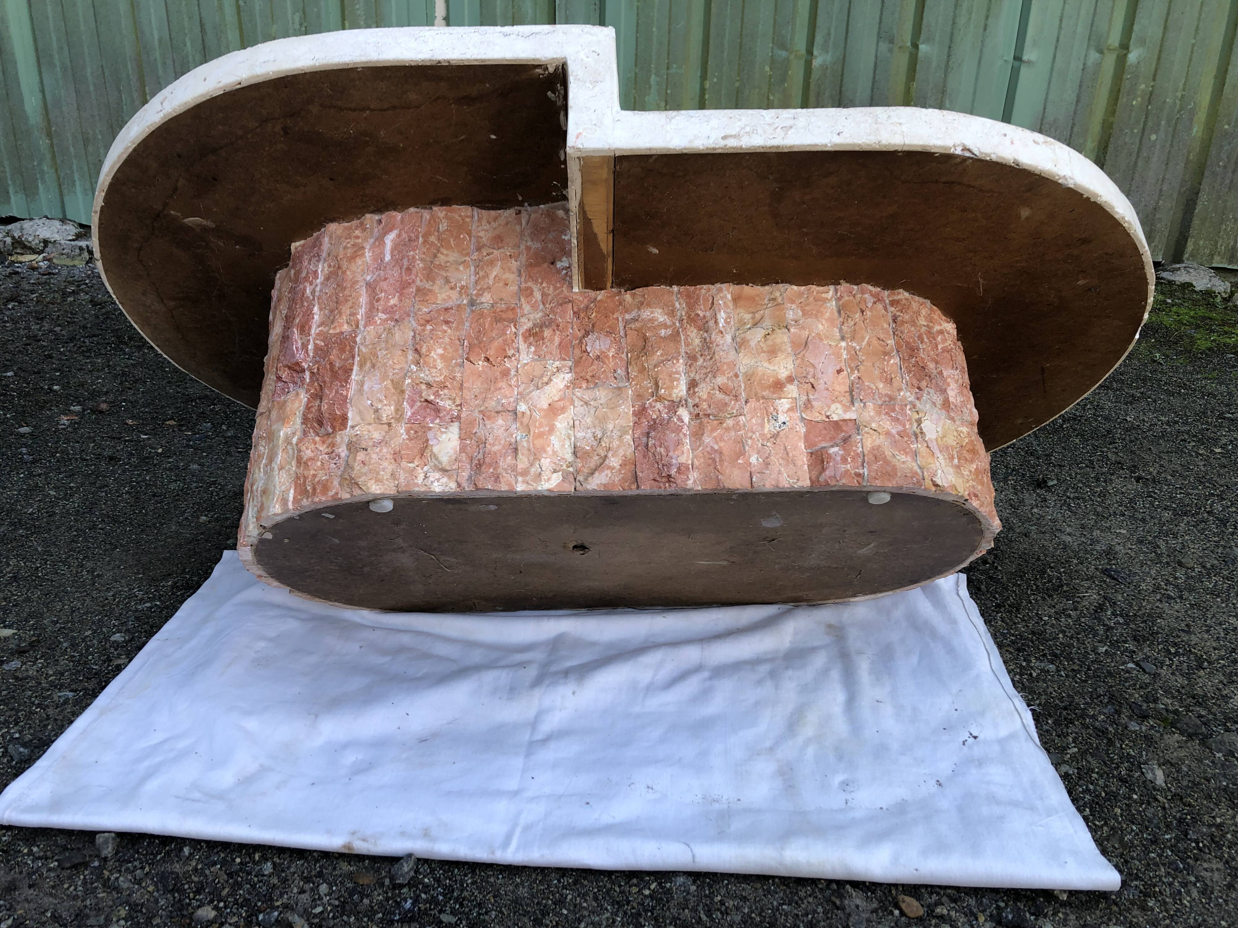 Vintage asymmetrical design coffee table in Mactan travertine stones by Magnussen ponte.