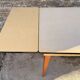 Beige French modernist extendable table, wooden legs, circa 1955.