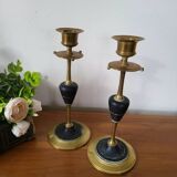 Pair of brass and black hard stone candlesticks