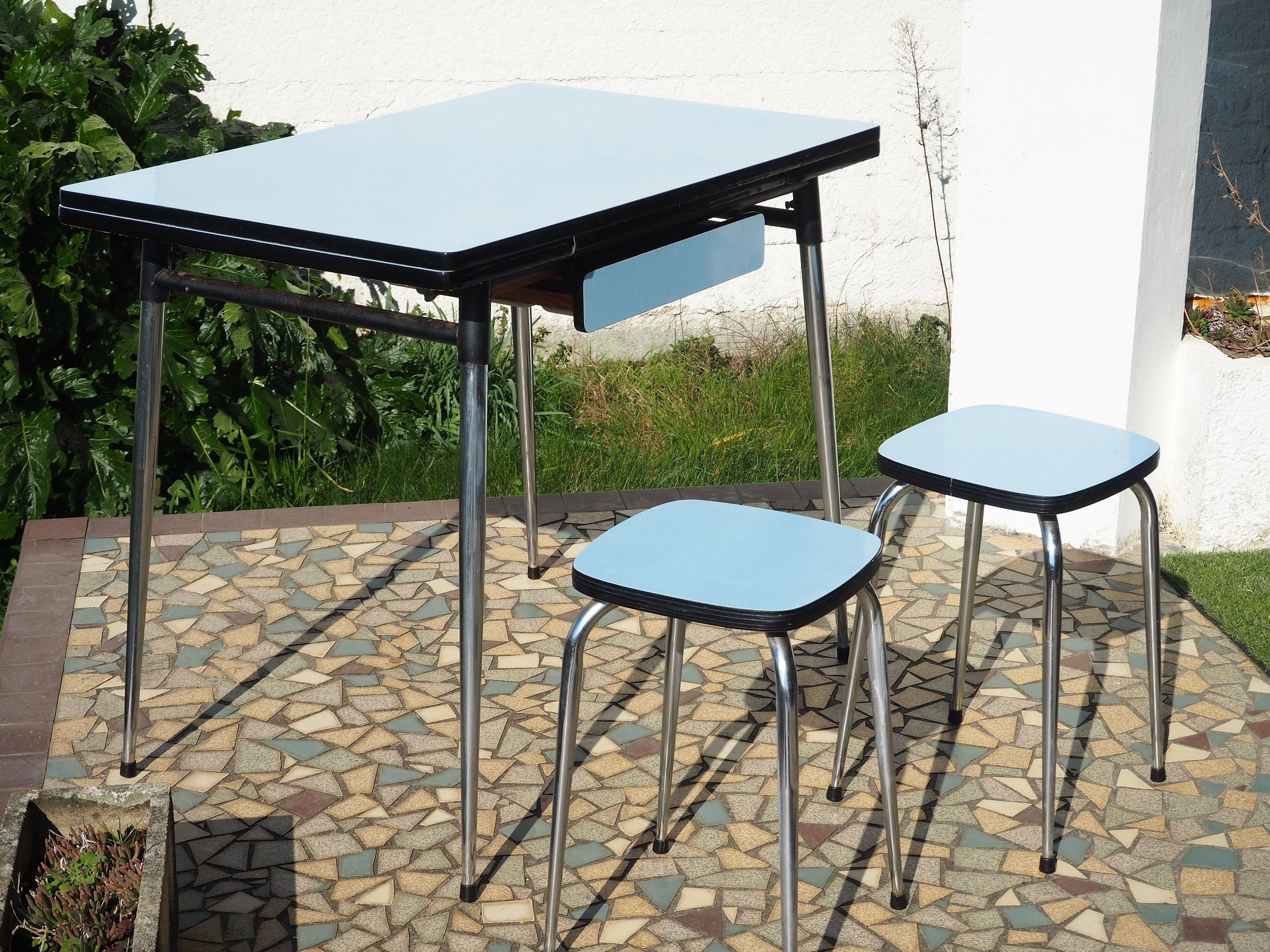 Blue formica table and two stools