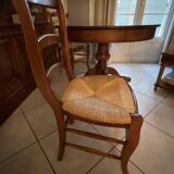 Round table with central leg in solid cherry wood