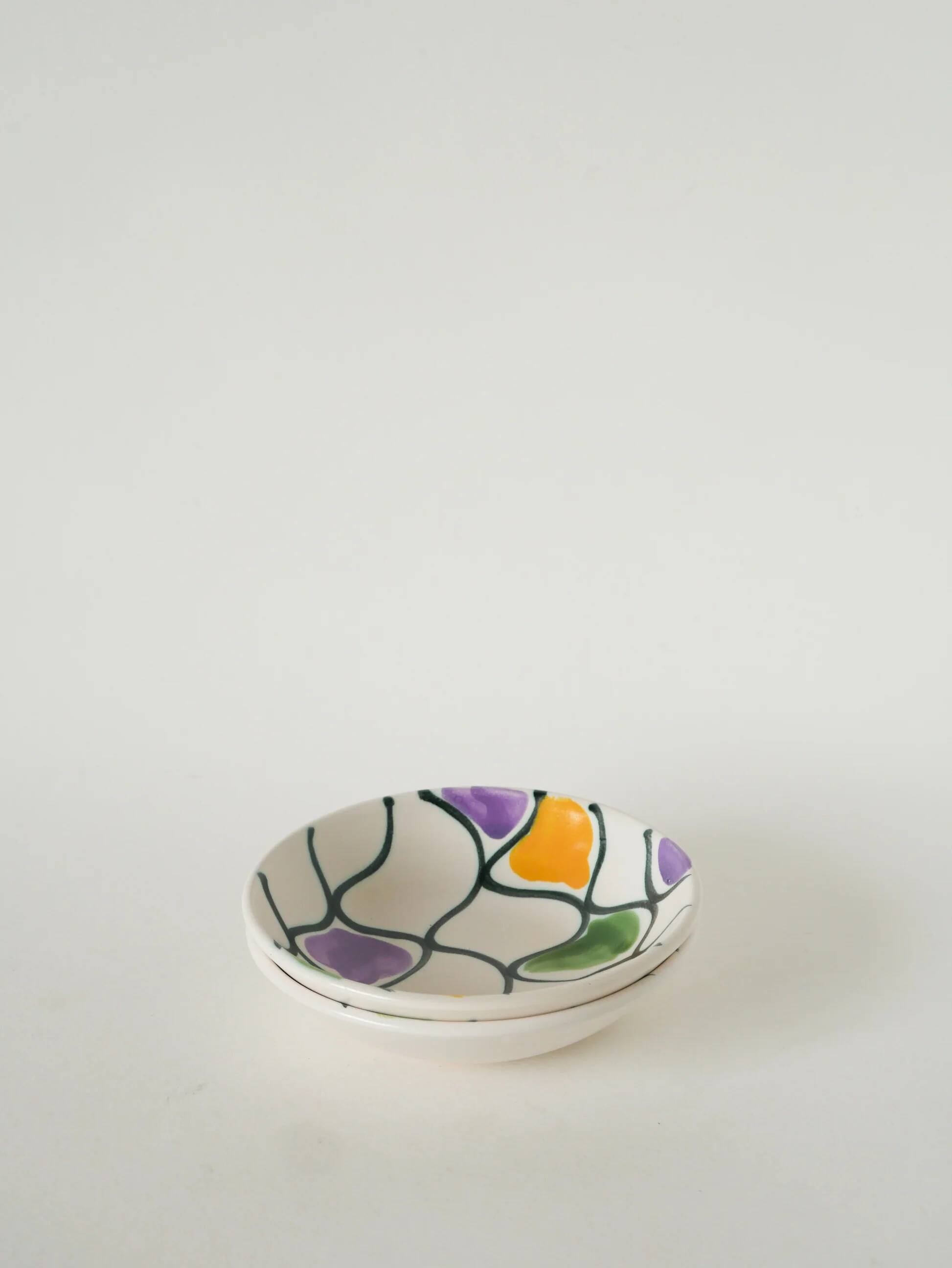 Pair of ceramic ramekins, abstract patterns in yellow, purple and green, Pornic model, 1960.