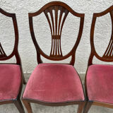 Set of 6 wooden chairs sitting red