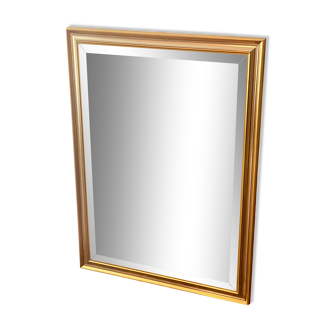 Beveled mirror with gold borders