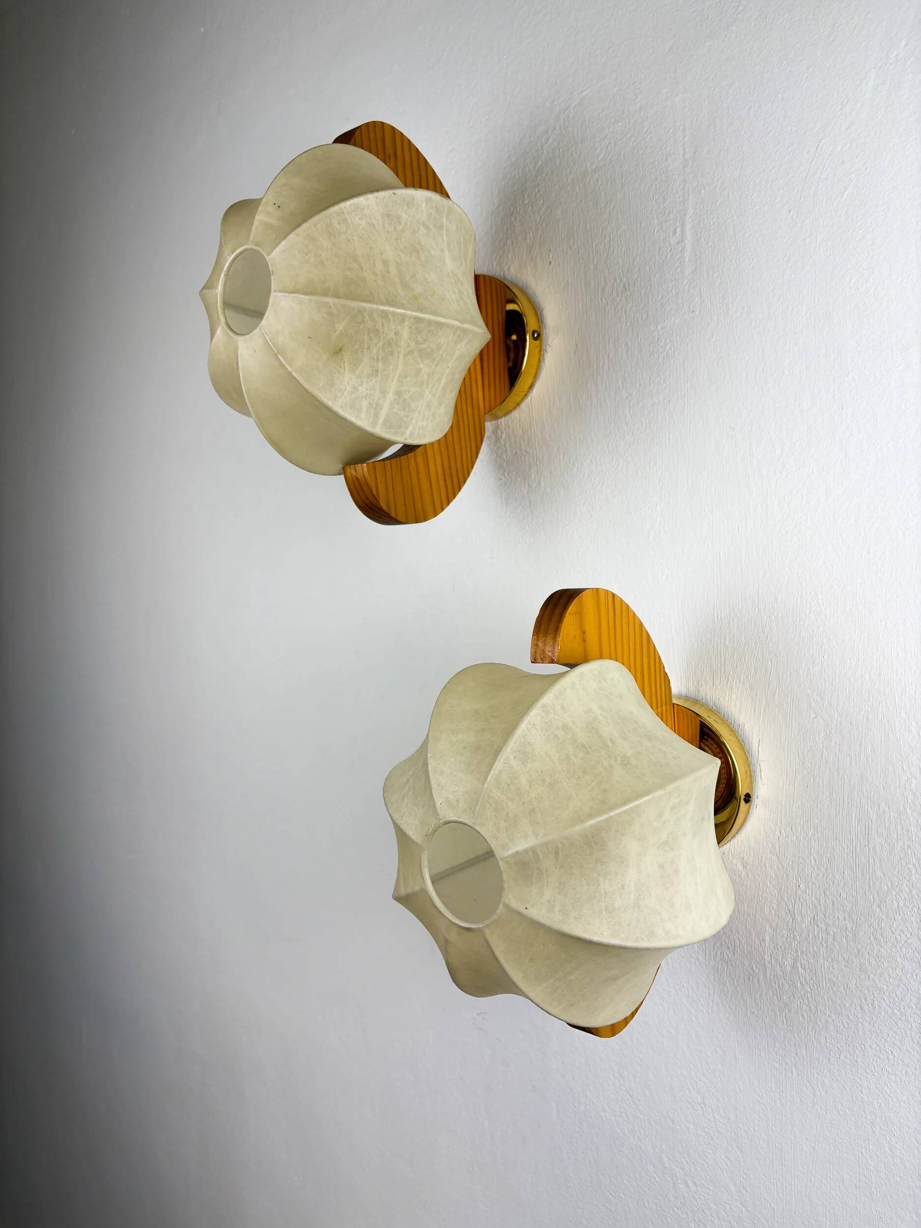 Pair of cocoon sconces with pine, Italy, 1970