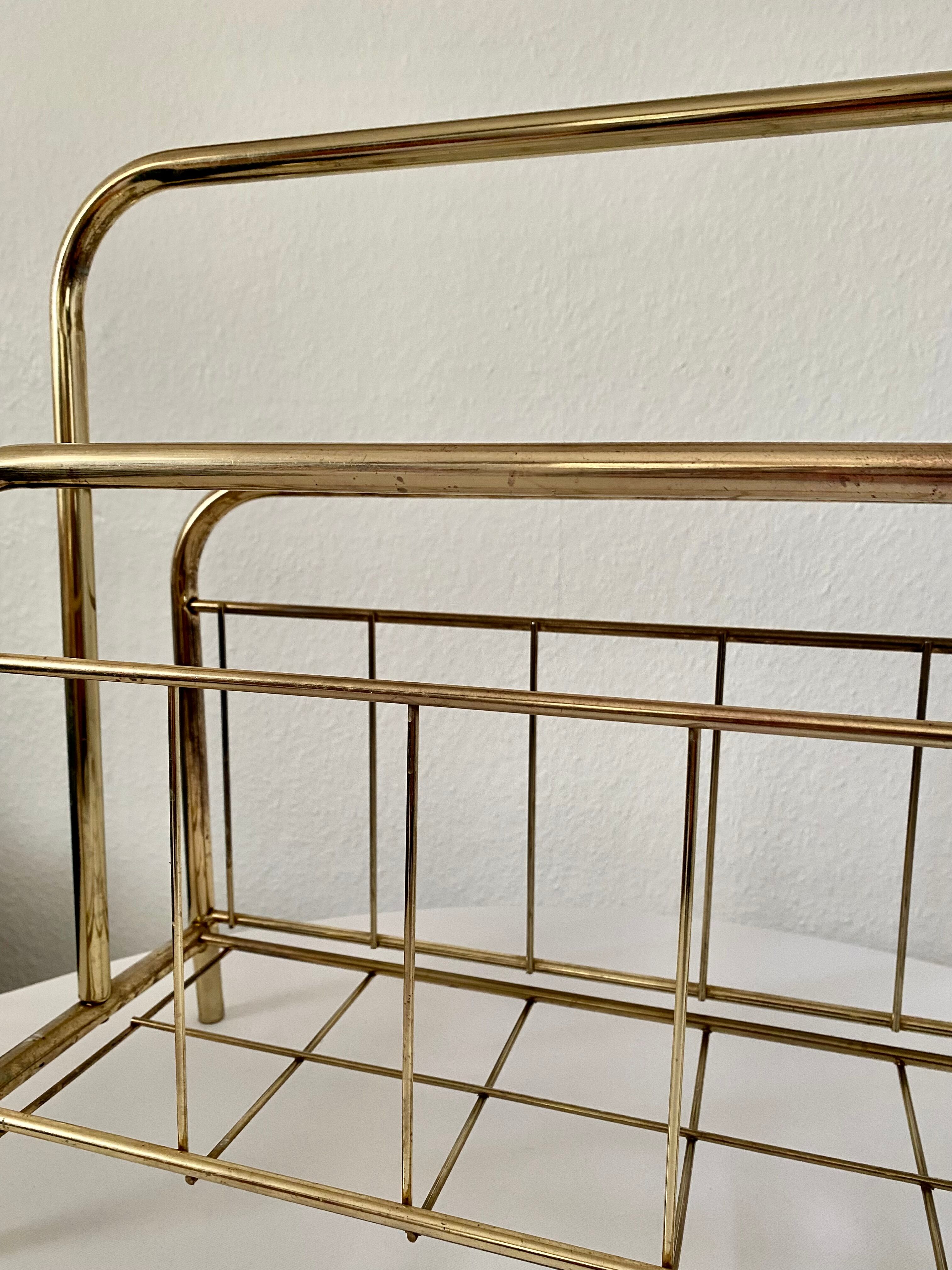 Gilded metal magazine door