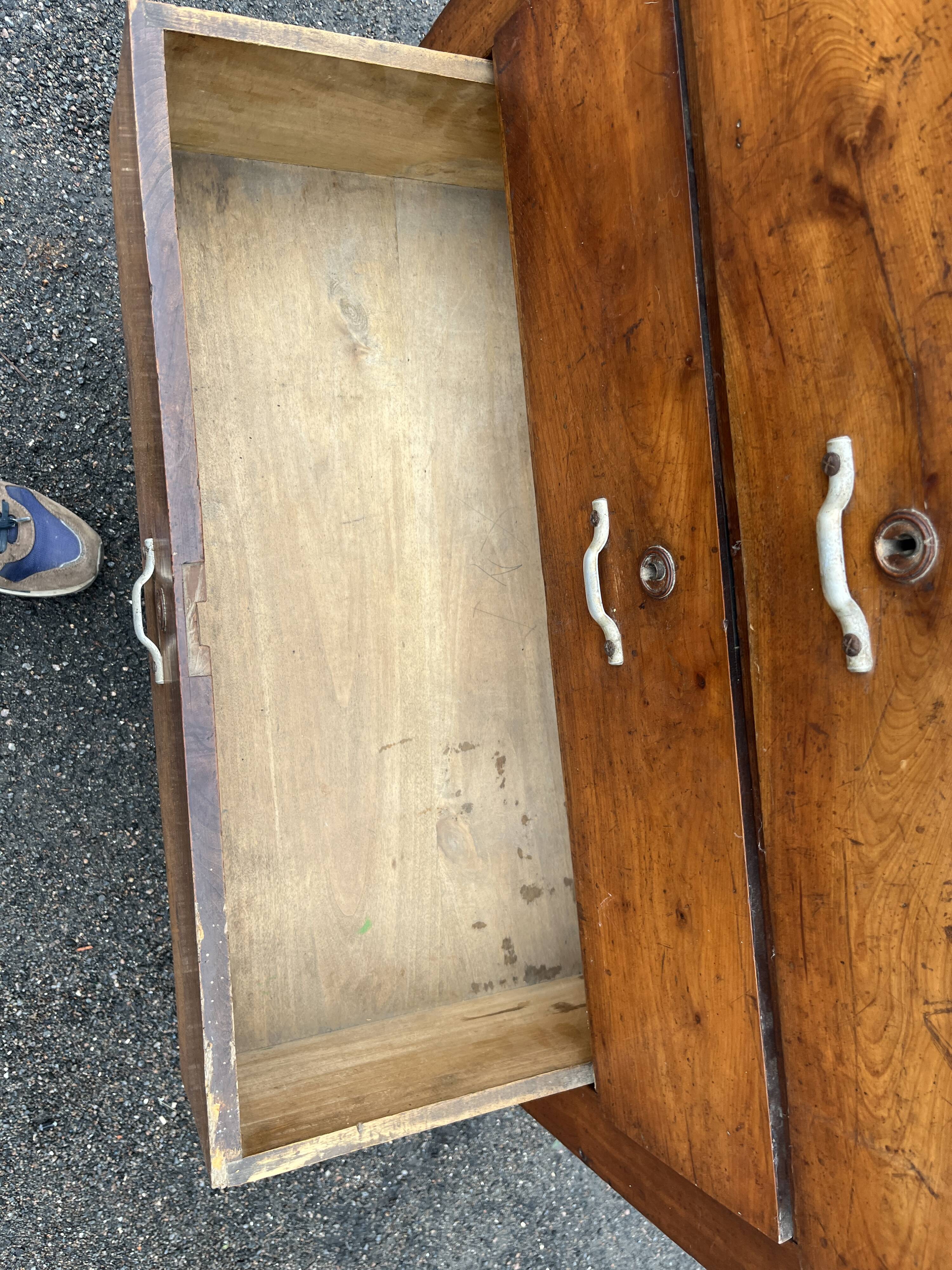 Antique 19th-century wooden chest of drawers with a marble top