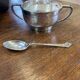 Silver sugar bowl and spoon