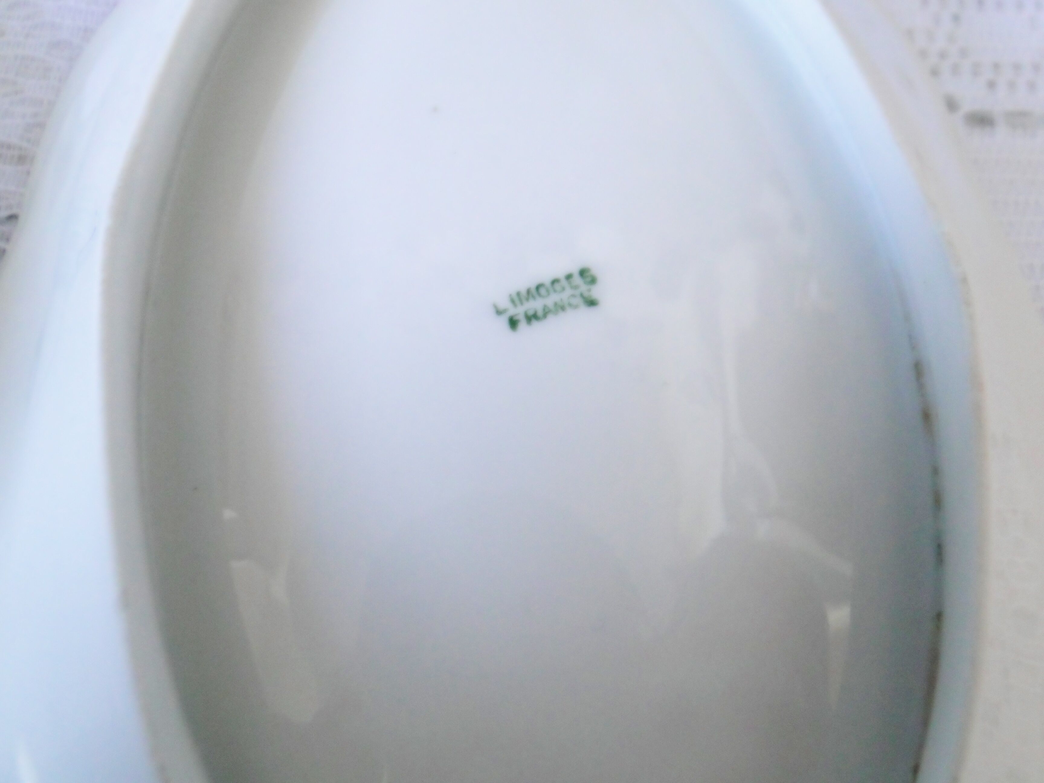 Lot 2 old porcelain raviers limoges decor petites roses on a white background