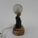 Art deco desk lamp sitting woman with globe