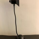 Articulated and adjustable black metal lamp