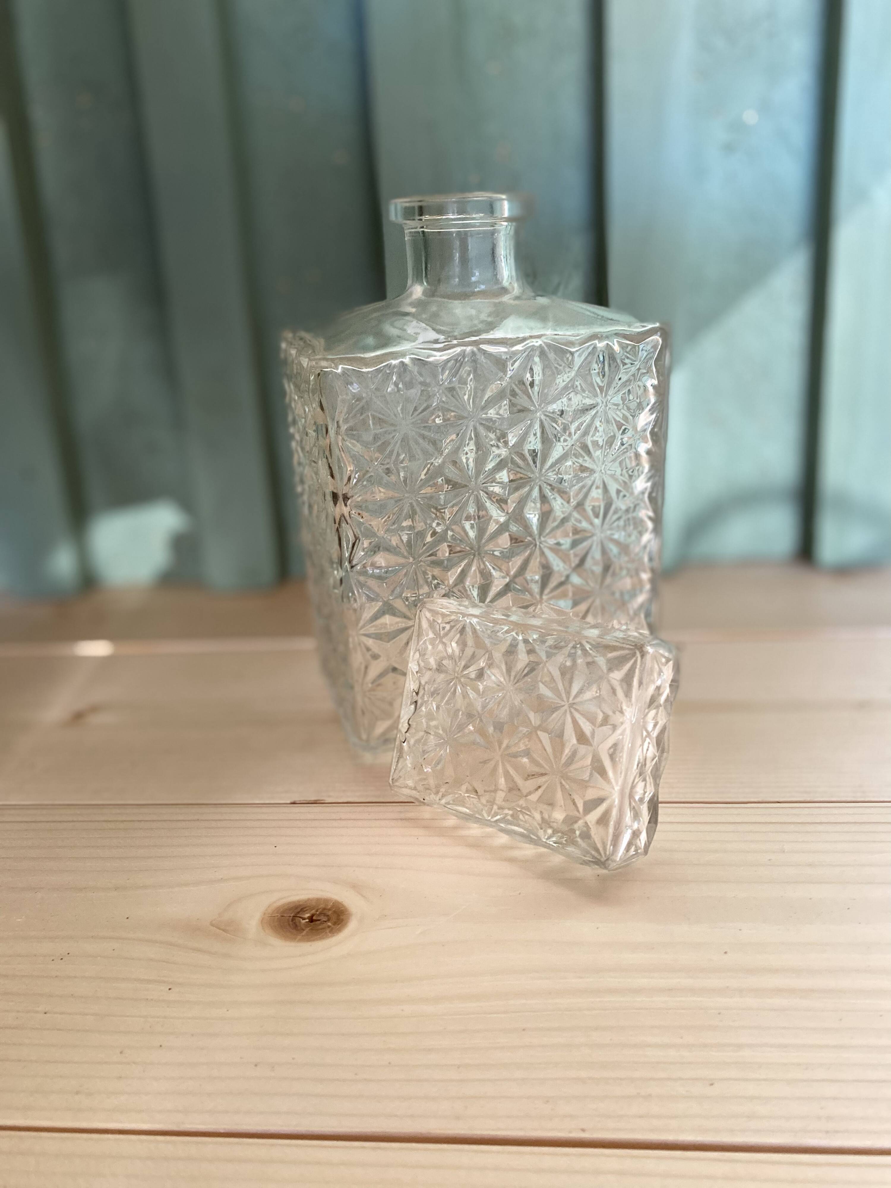 Old molded glass whiskey bottle