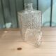 Old molded glass whiskey bottle