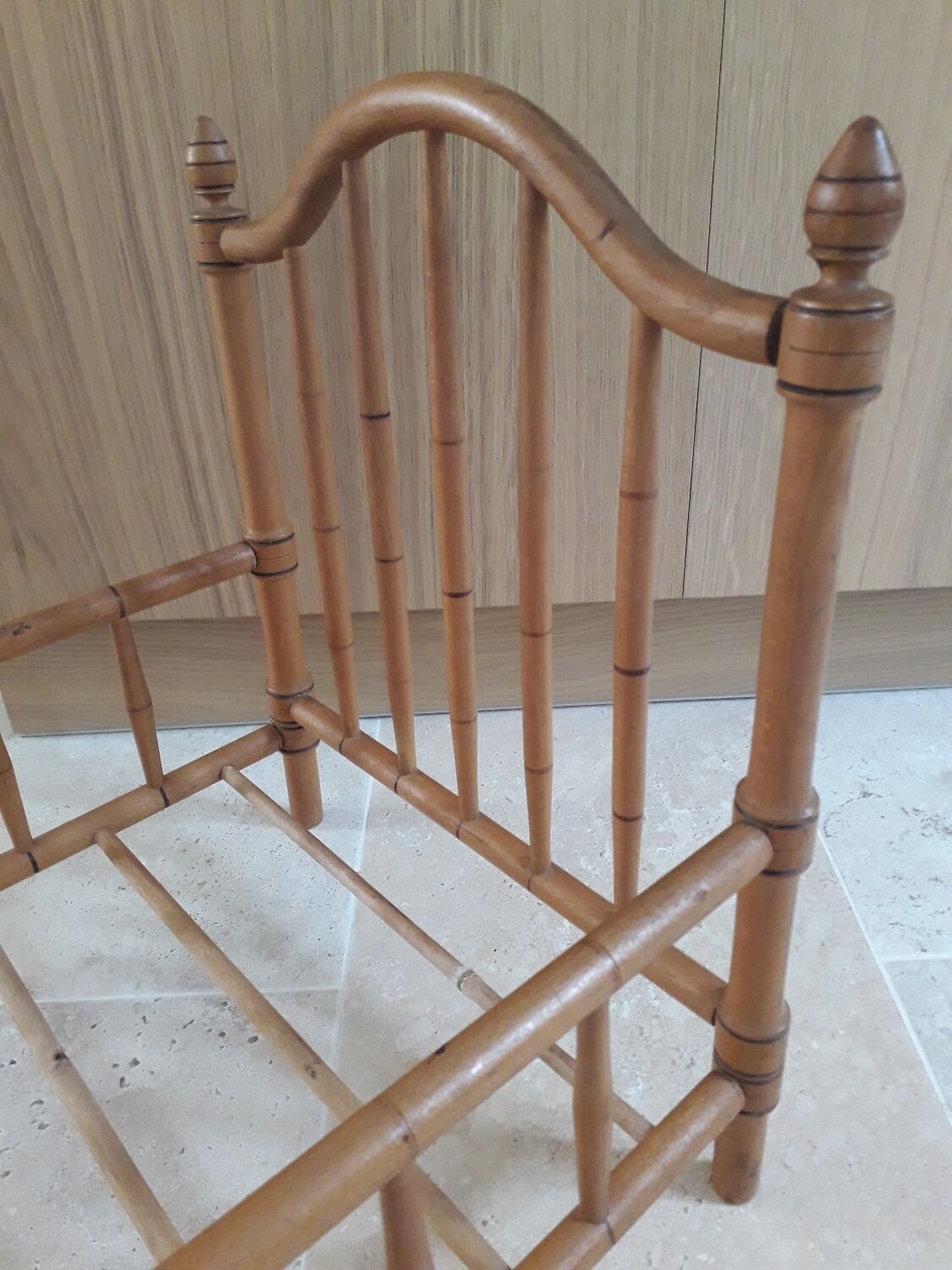 Old wooden doll's bed