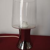 Table lamp, chrome glass stand and transparent glass globe.