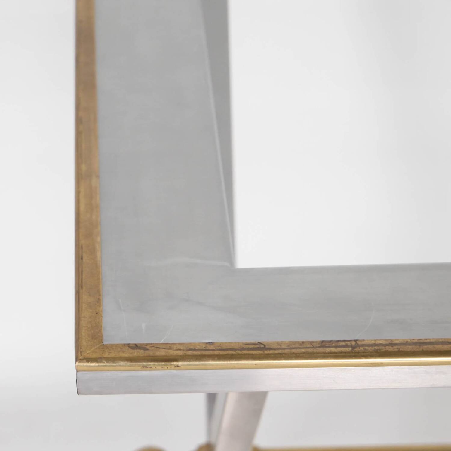 Stainless steel and brass table