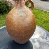 Glazed terracotta oil jar jug