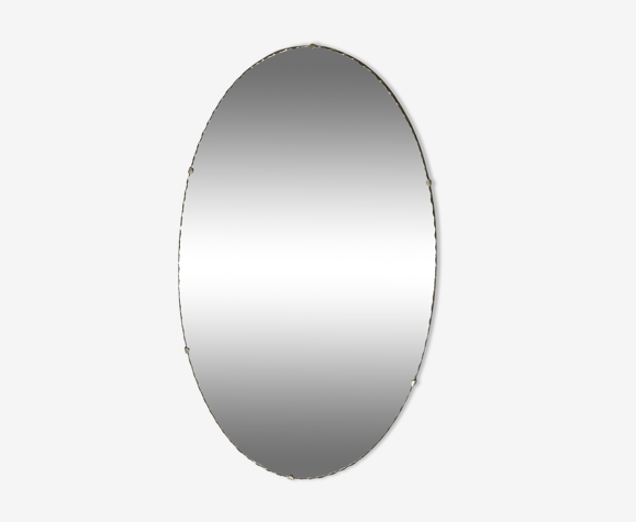 Chiseled oval mirror