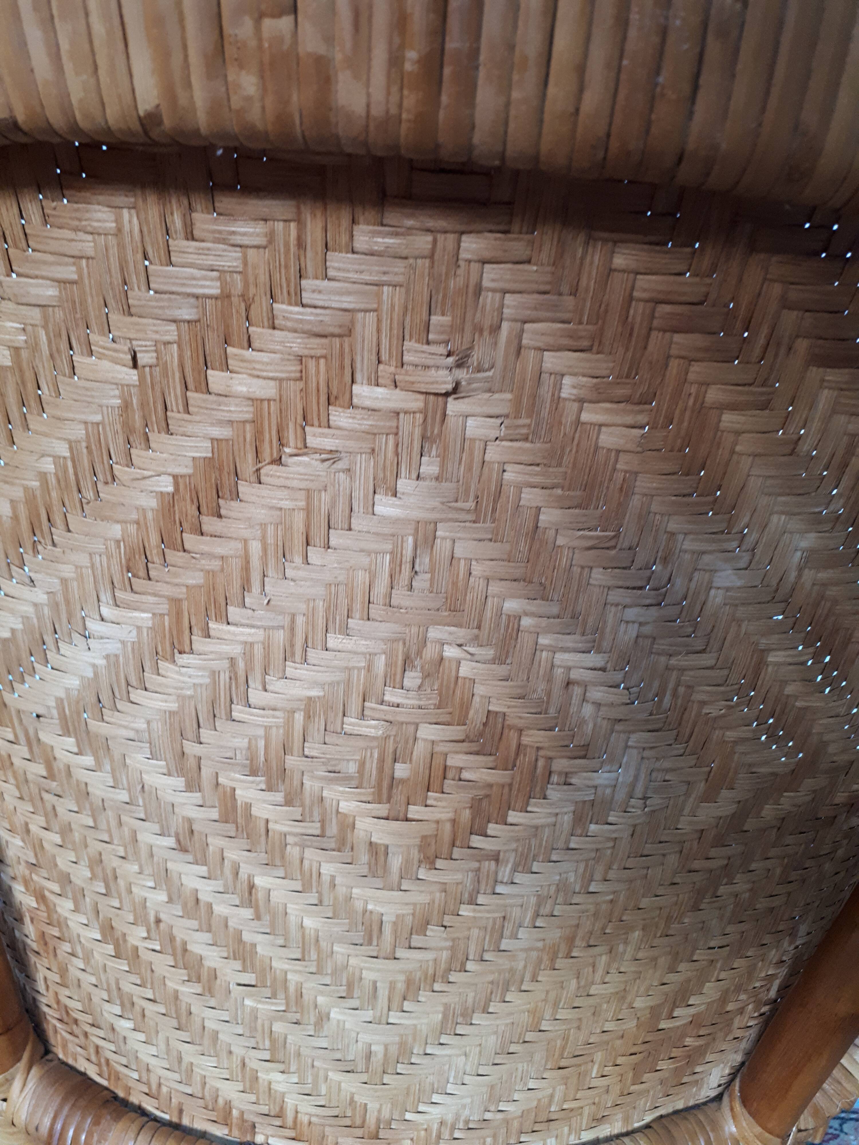 Pair of armchairs in braided rattan 70s