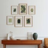 Collection of 6 abstract paintings on sage green paper, signed Eawy