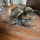 Brass flower candle holder