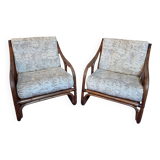 Pair of vintage rattan armchairs  
1960s–1970s