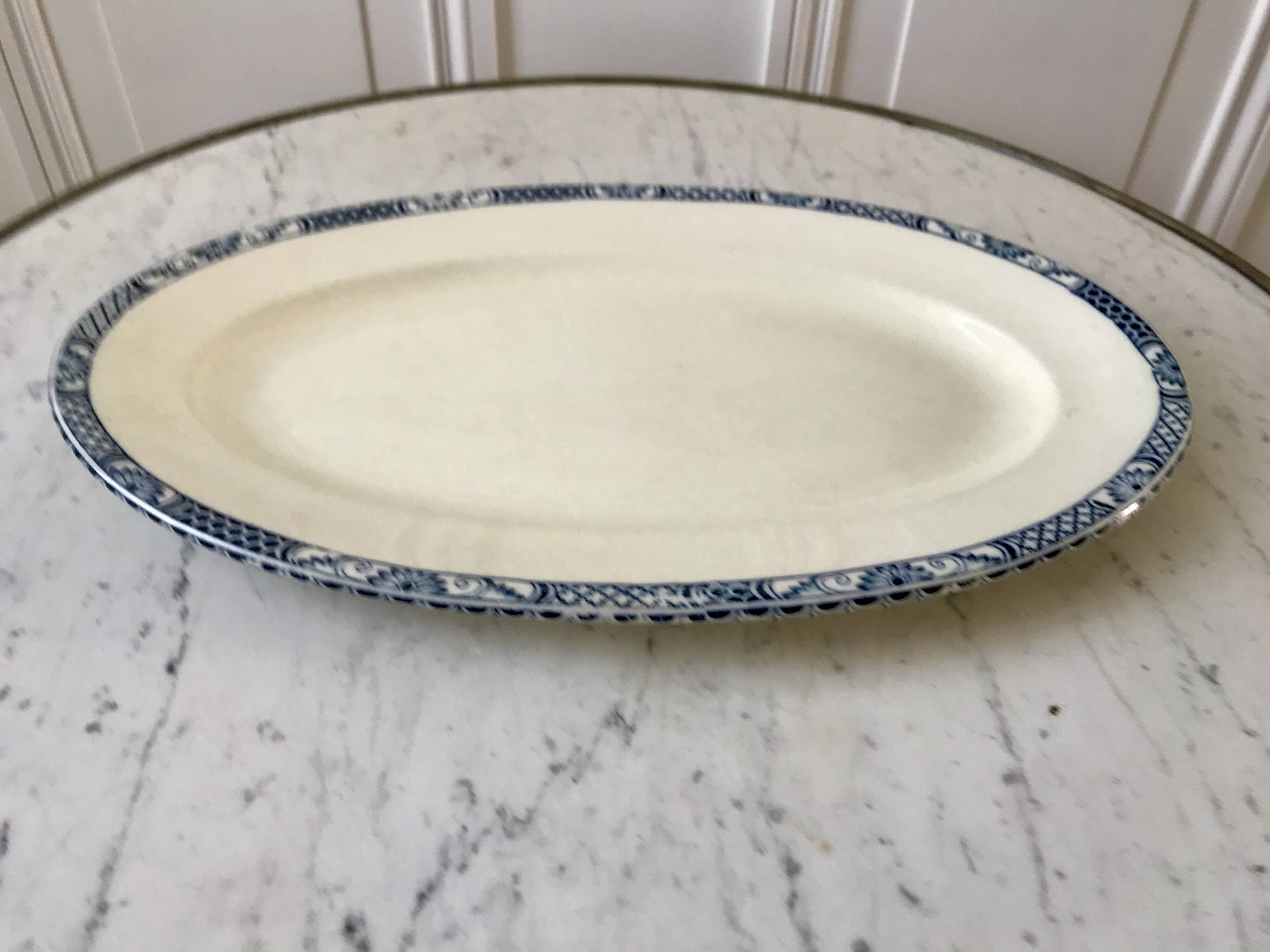 Oval dish in terre de fer bleu xixth