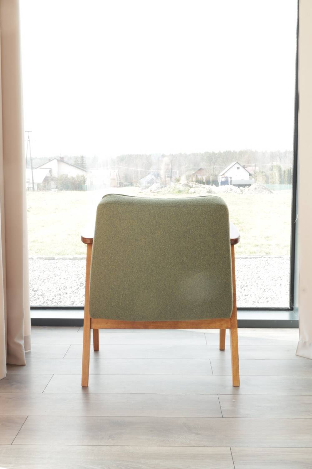 Vintage olive green bouclé armchair model 366