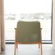 Vintage olive green bouclé armchair model 366