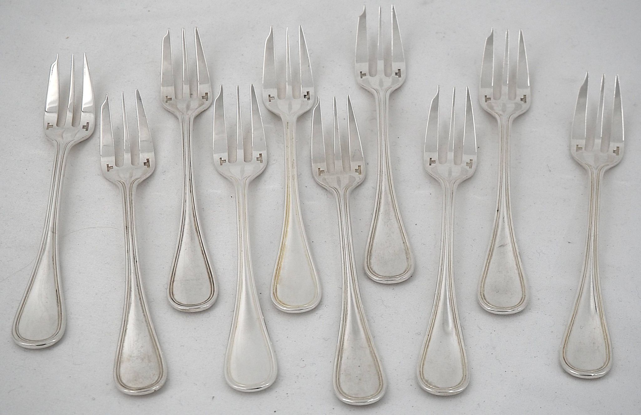 Christofle Albi, 10 silver-plated cake forks, excellent condition.