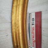 Miroir ovale doré