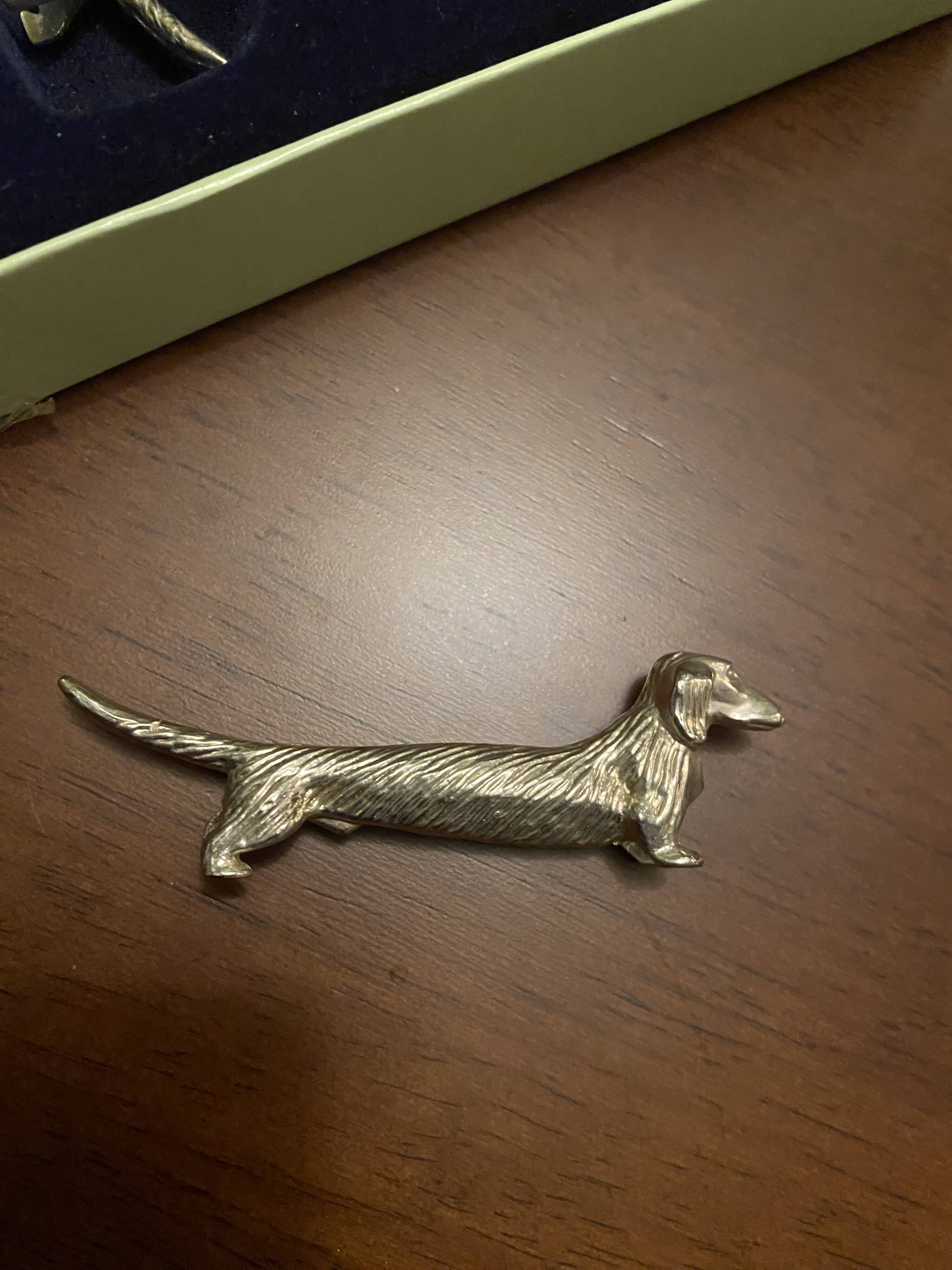 Silver dachshund knife holder