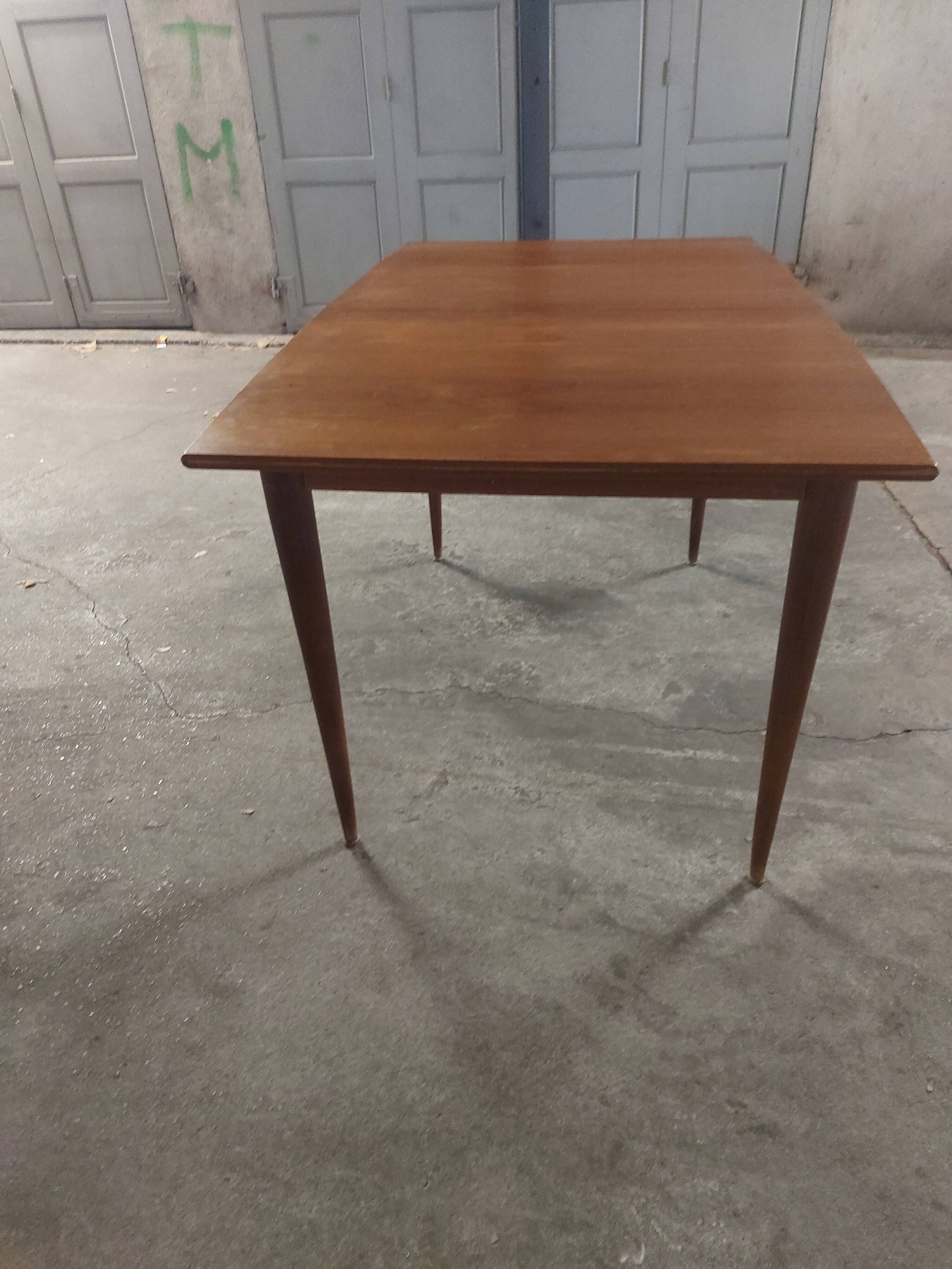 Scandinavian teak table with built-in extension
