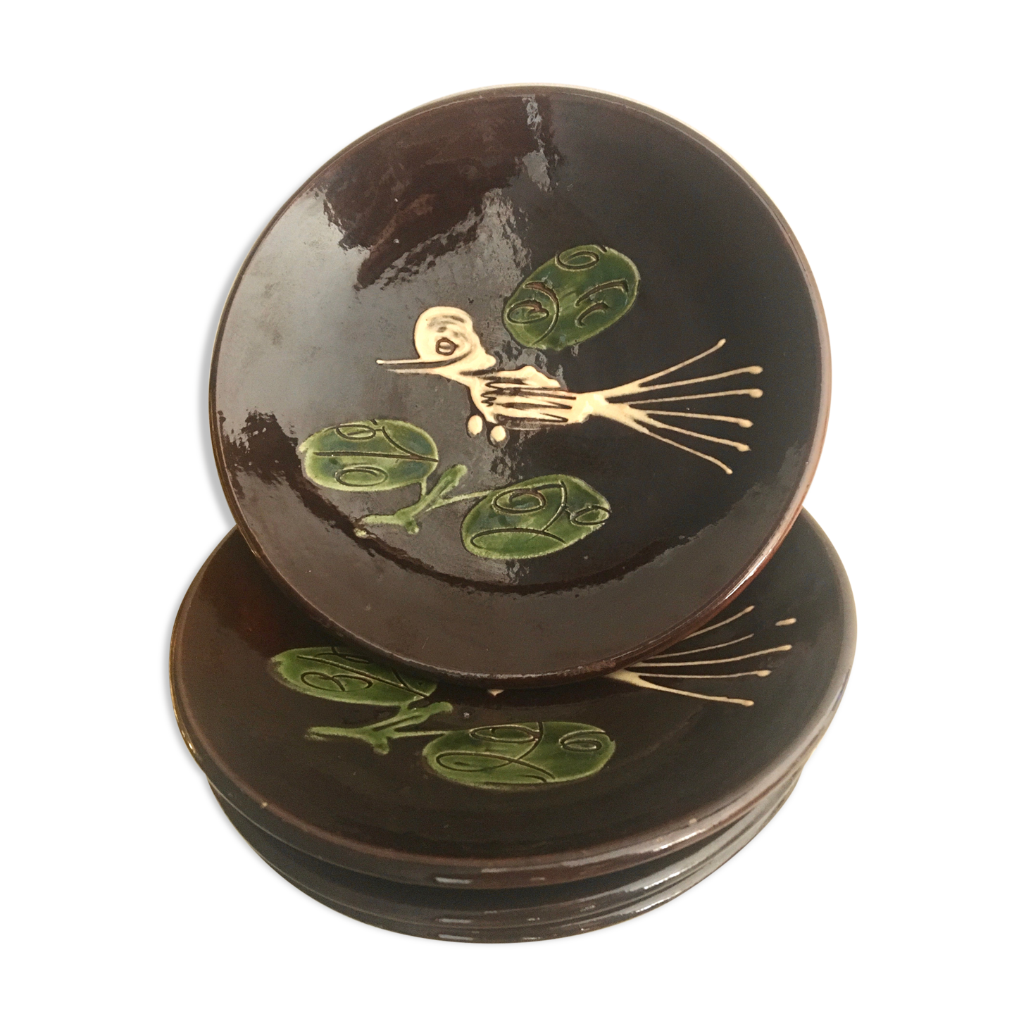 Four decorated ceramic plates