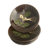 Four decorated ceramic plates
