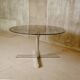 Roche Bobois - Round dining table in smoked glass and chrome-plated steel - c 1975