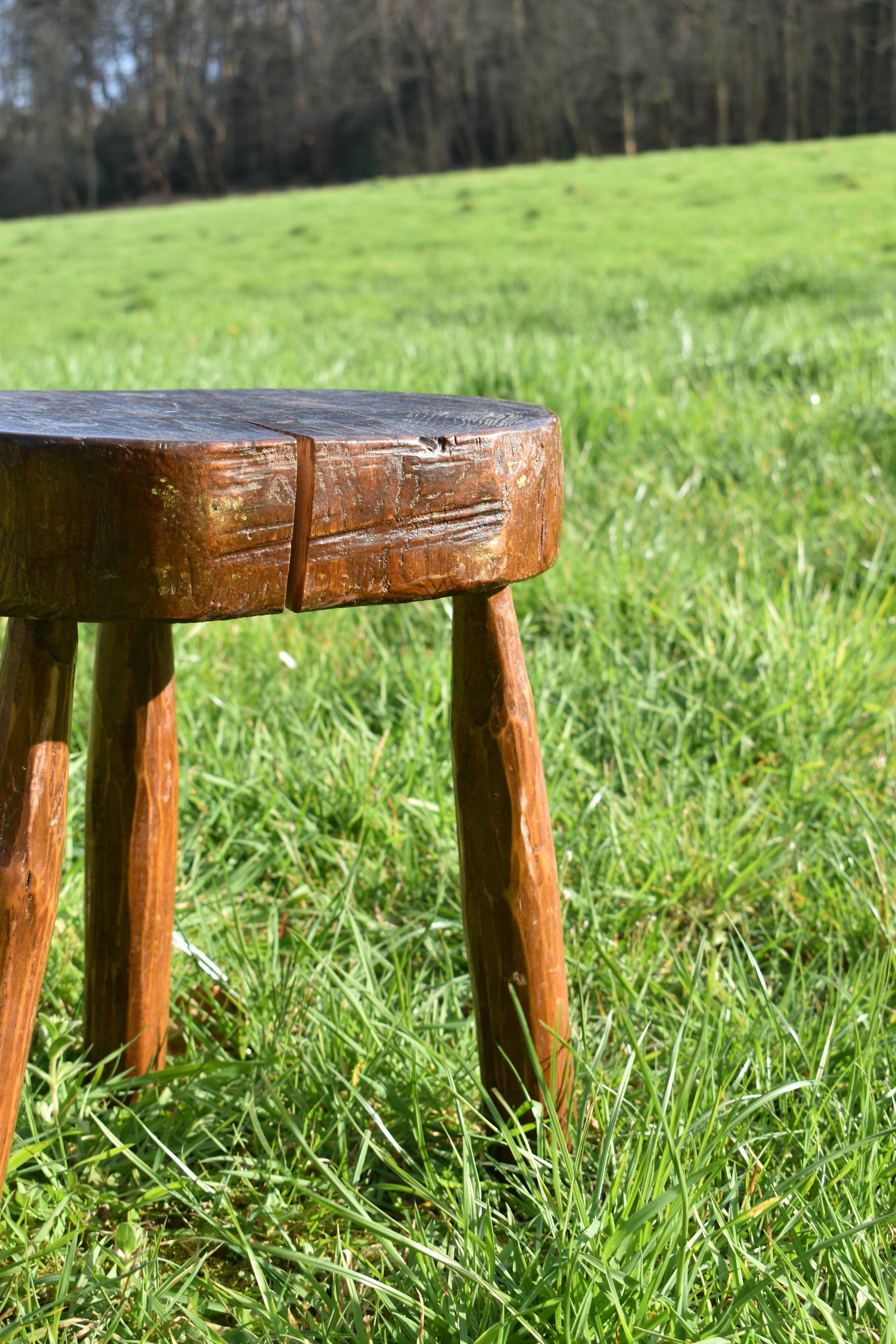 Ancient tripod brutalist stool