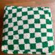 Moroccan Berber pouf with fir green and bohemian off-white checkered