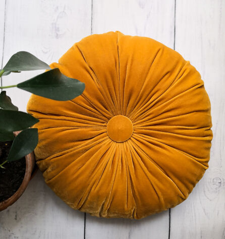 Round cushion in yellow