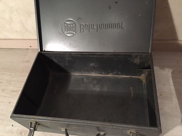 A crate, box or metal suitcase in undue style 60/70