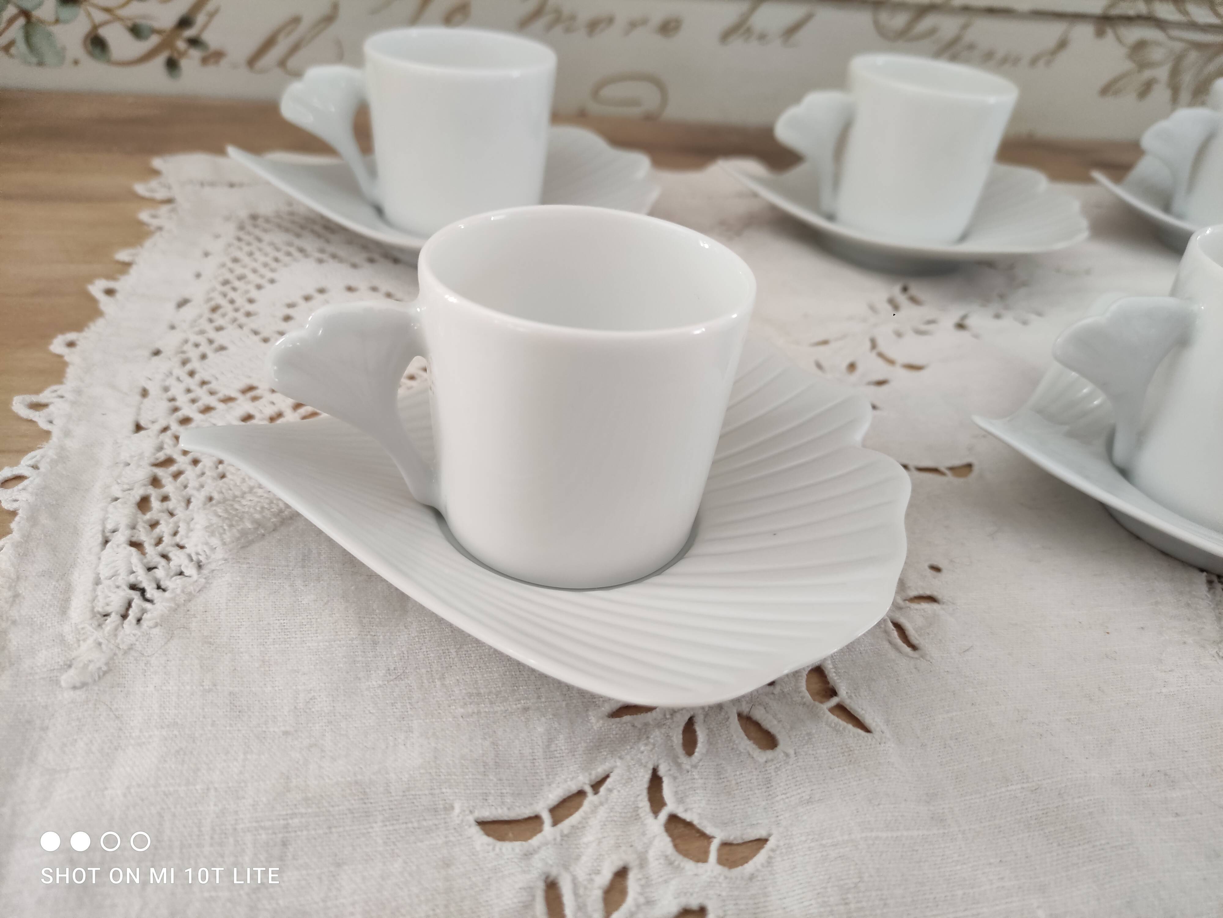 Set of 8 espresso coffee cups and white Limoges porcelain sub-cups scallops