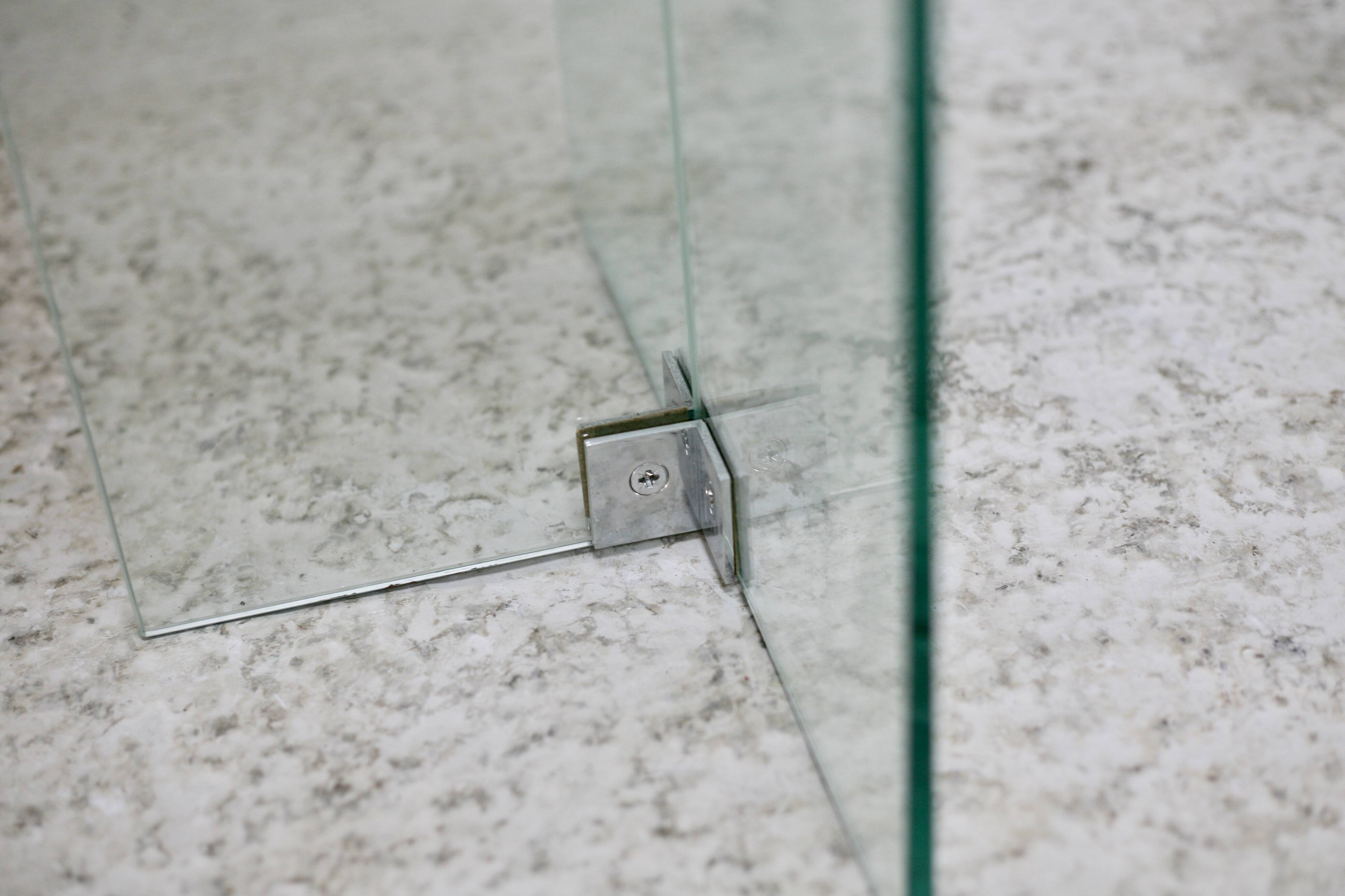 Modernist console, 1960s, glass base, wooden and fabric top.