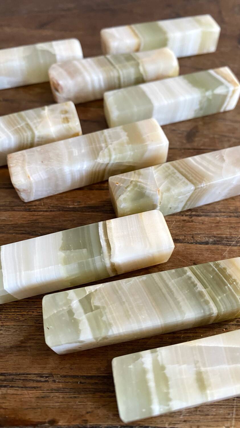 Minimalist knife rests in natural stone