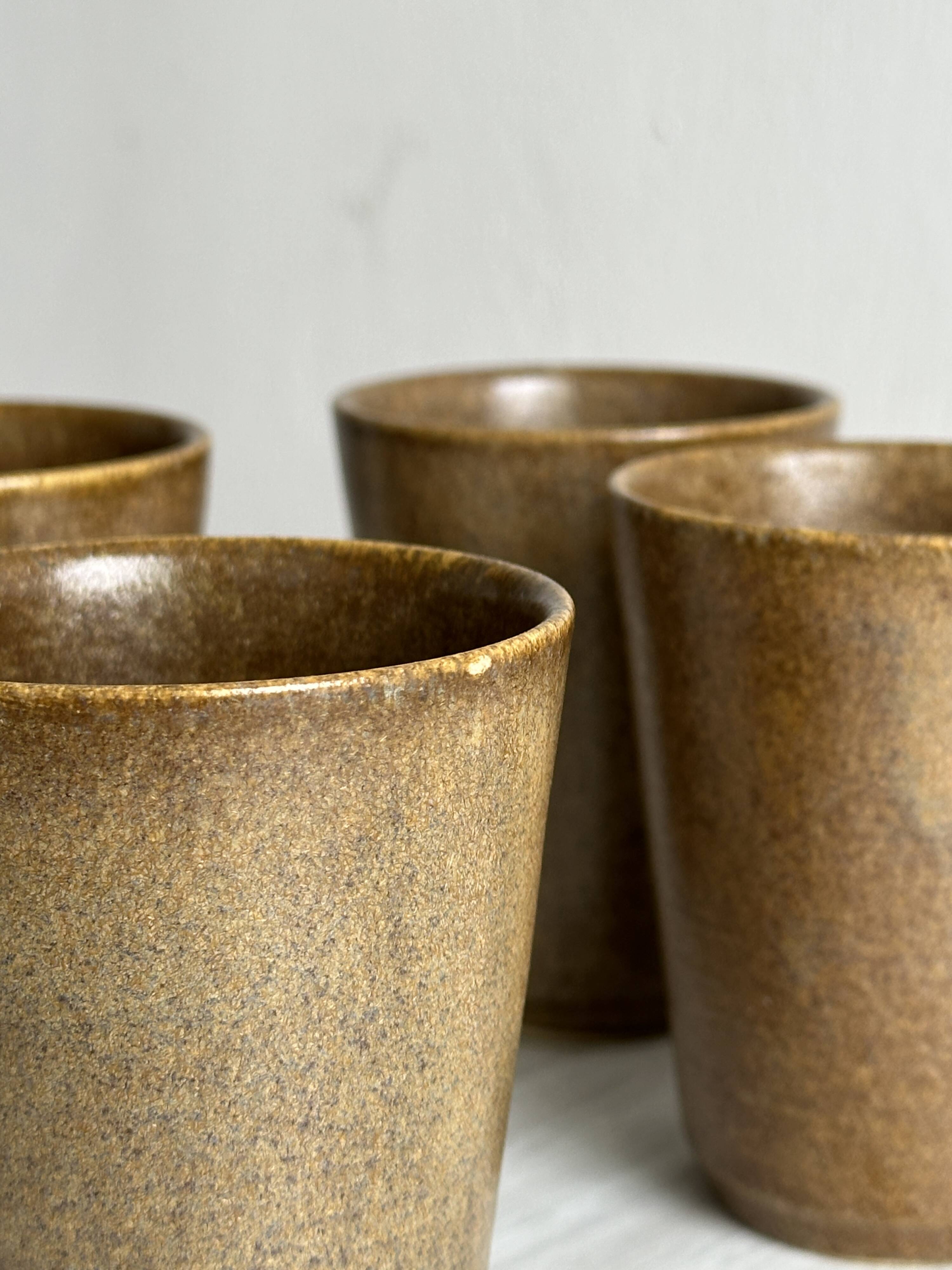 Set of 5 Digoin stoneware mugs