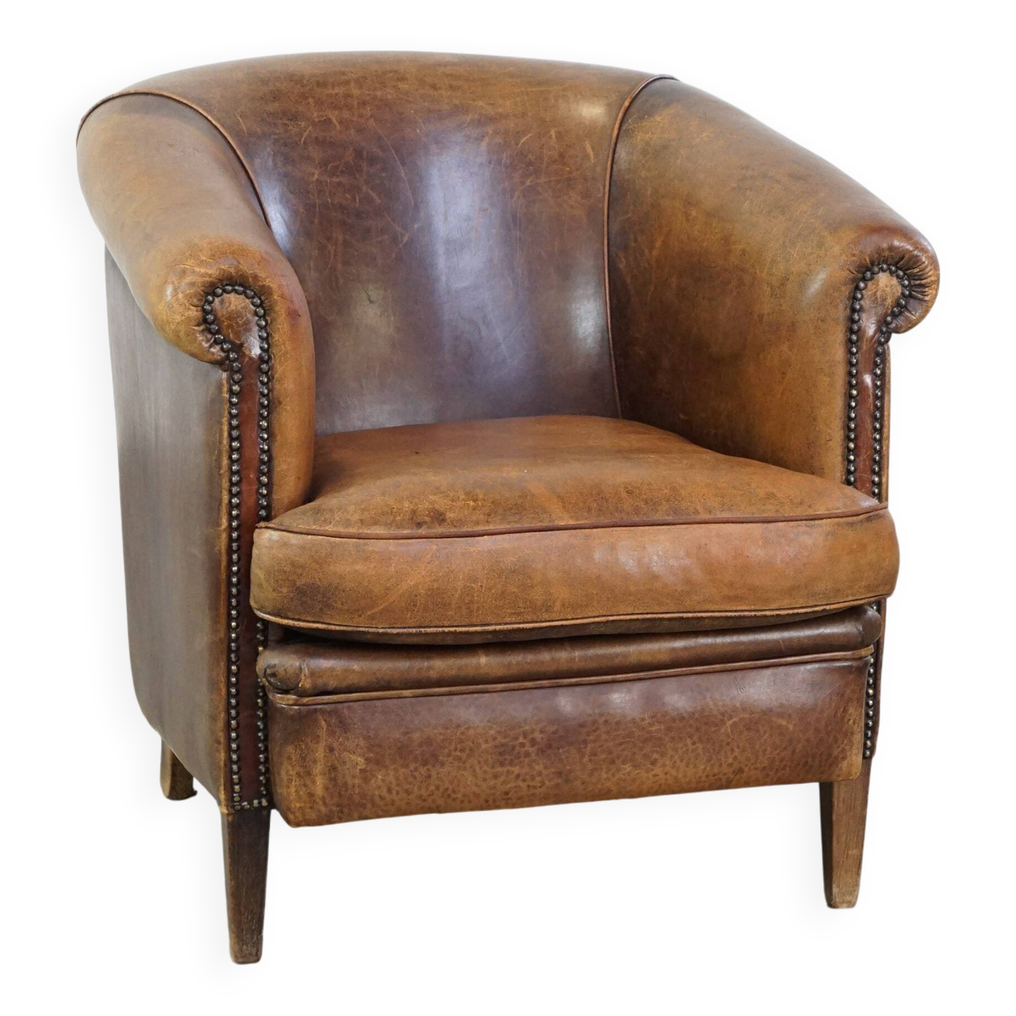 Characterful sheepskin leather club armchair with a luxurious, rustic appearance