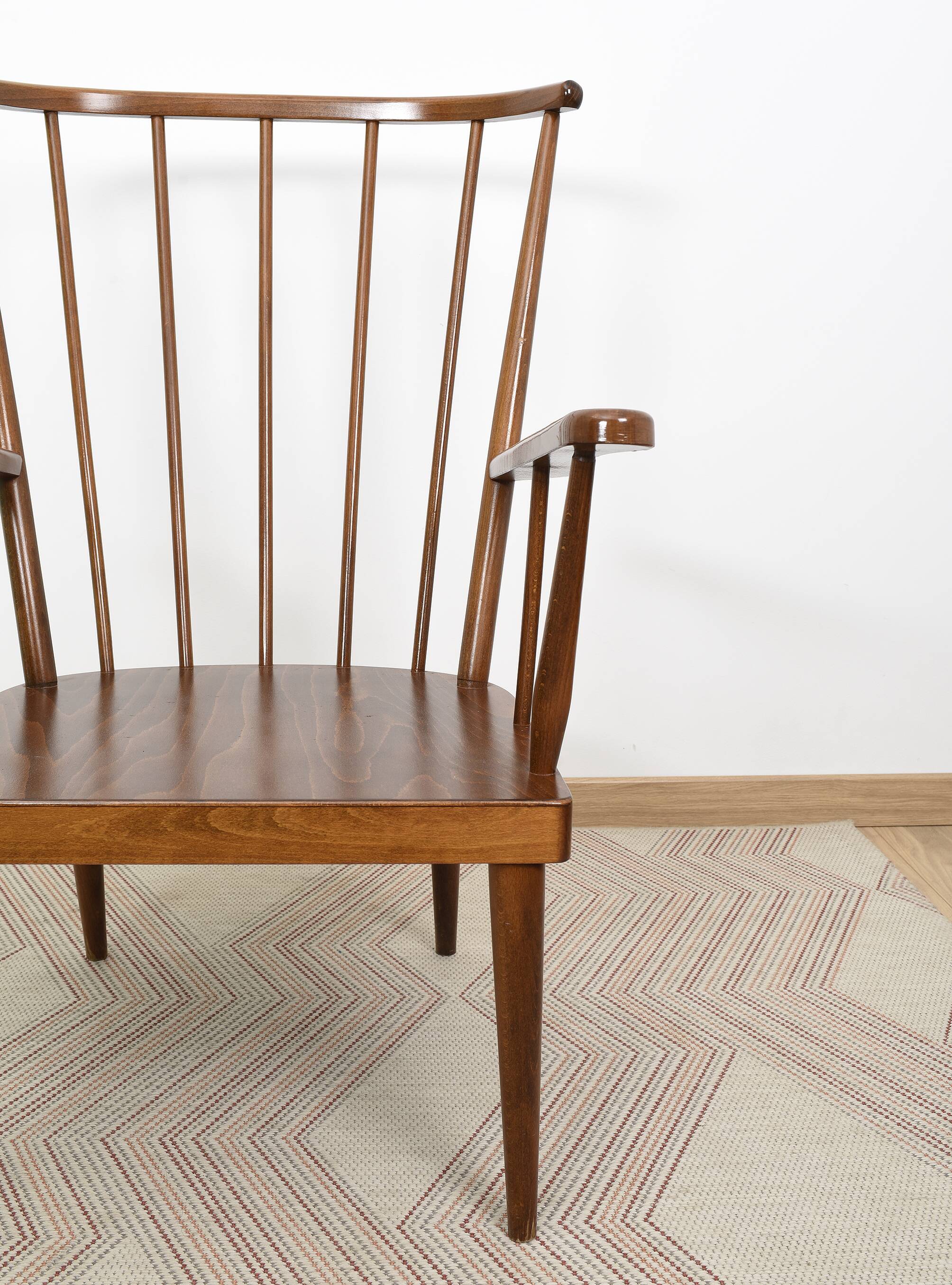 Pair of Éventail armchairs signed Baumann 89