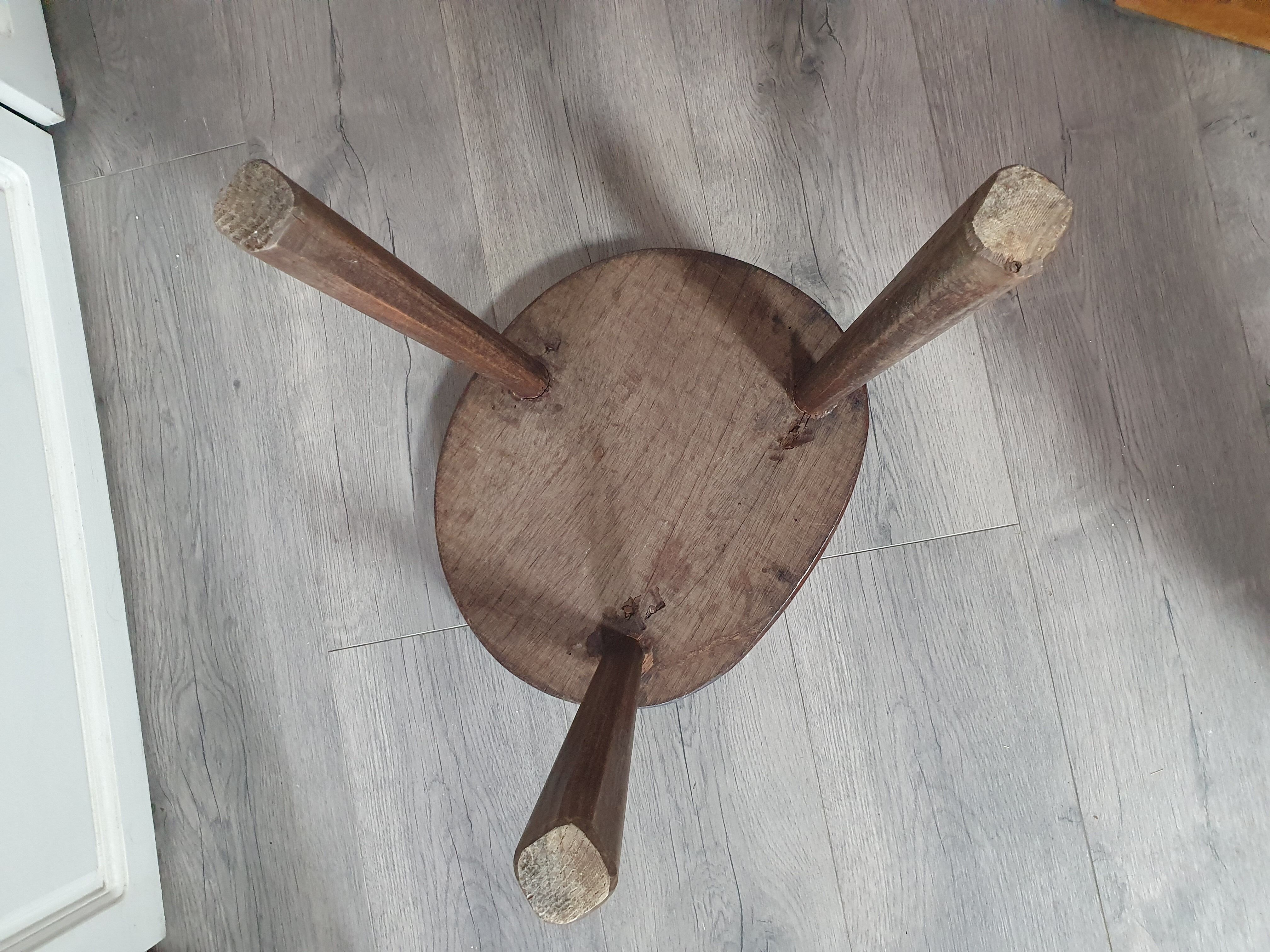 Vintage old wooden stool tripod