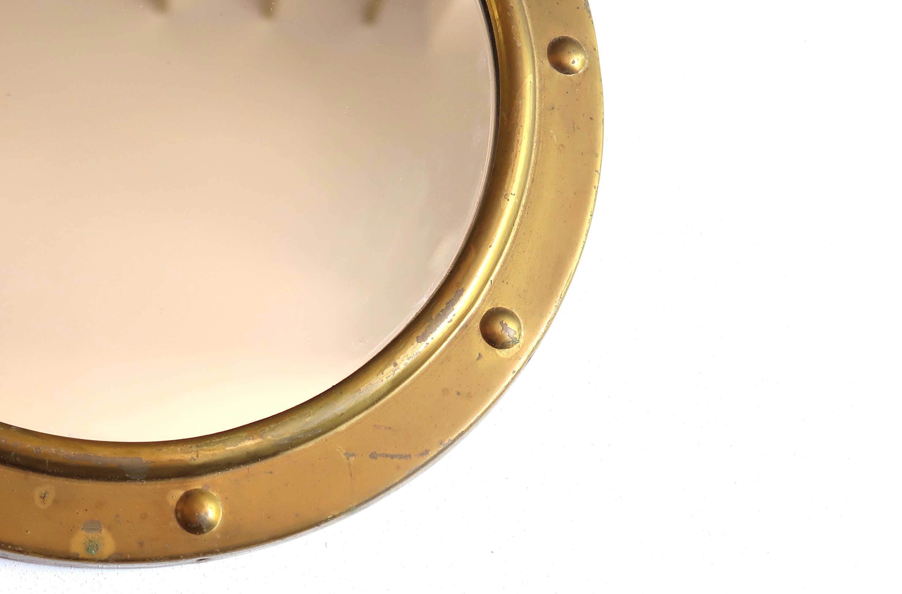 Round brass porthole mirror, 60s