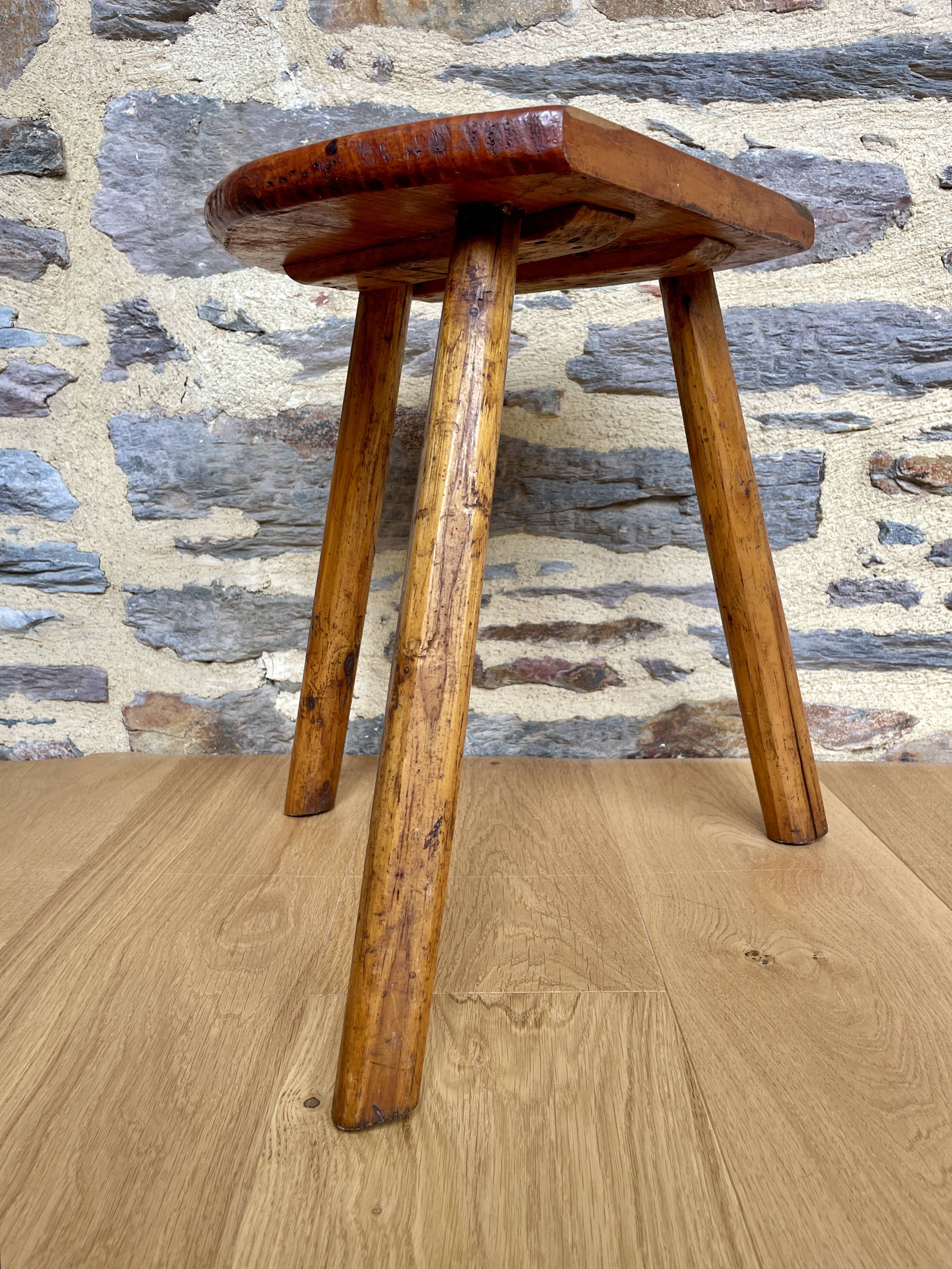 Old wooden farm stool