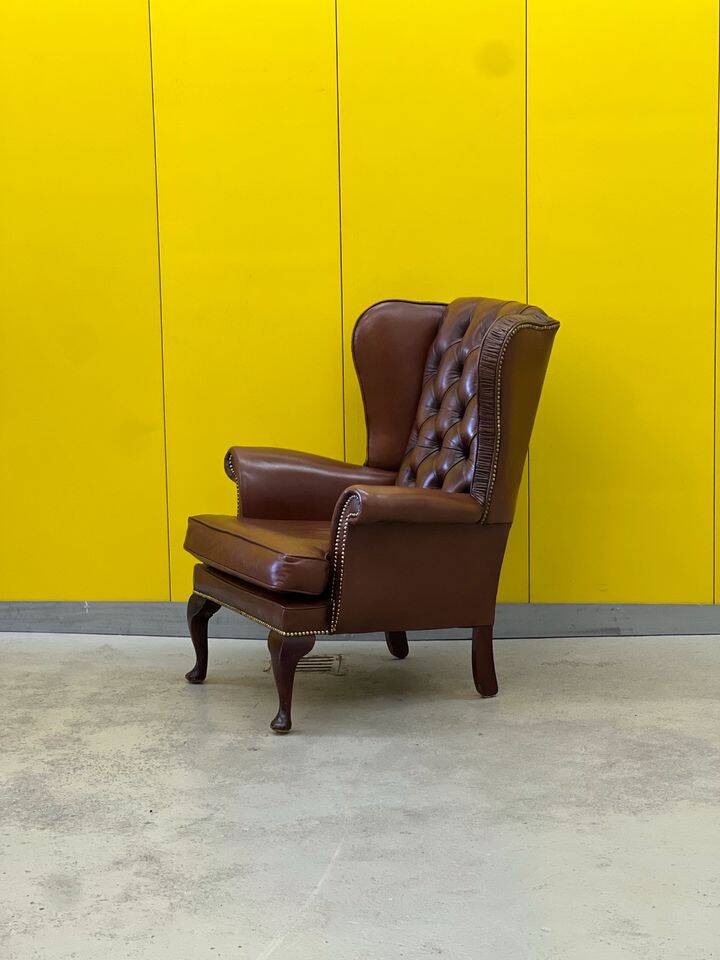Fauteuil Chesterfield traditionnel anglais en cuir